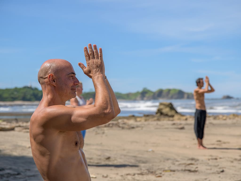 Beach meditation and mindful movement at Playa Pelada Nosara