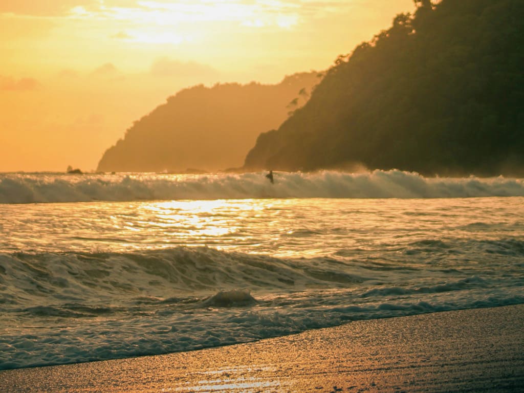 Playa Nosara sunset waves on Costa Rica’s Pacific coast.