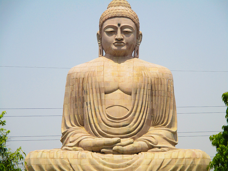 Great Buddha statue at Bodhgaya India — the origin of Buddhism explored in Aknanda's guide to Zen